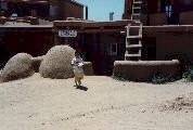 Taos_pueblo_stoves_mini.jpg (8443 bytes)